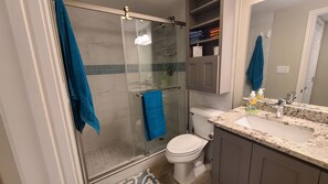 New remodeled bathroom higher toilet new shower, cabinets, countertop,paint tile