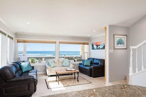 Spacious downstairs living area with direct ocean views