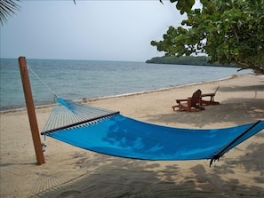 Let your cares drift away as you lay back on this romantic hammock made for two!