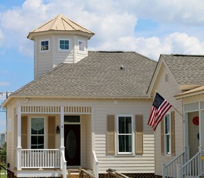 Front Exterior Photo of Bungalow with Cupola.