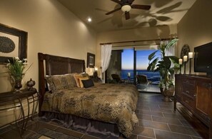 Stunning master bedroom with ocean views.