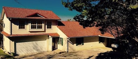 Front of Lake-House with circular Driveway & Carport 