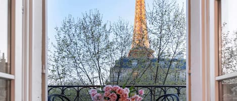 Watch the Eiffel Tower light up at sunset.