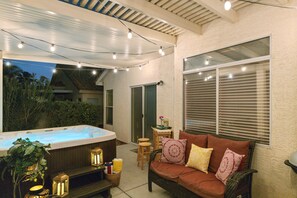 Back Patio with Hot Tub 
in Evening
