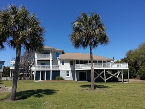 View of house from back yard. Deck has great view of ocean.
