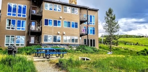  Middle Condo Right side.  Corn Hole on ground level.  Gas grill, picnic tables.