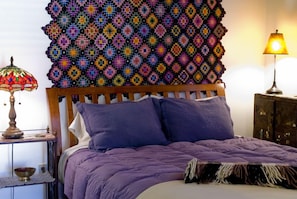 Queen bed in Grandpa's with LL Bean comforter & linens. Grandma's crochet work.