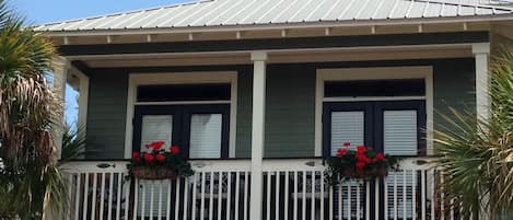 'Cozy for Two' front deck with French doors opening to bedroom & living room.