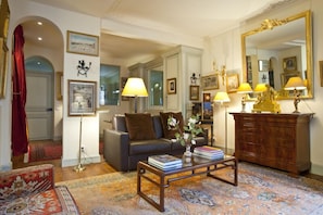 Empire living room full of sun.