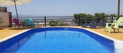 Views from the pool to the Guadalhorce Valley and Malaga city.