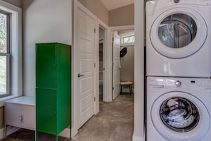 Mudroom entry. Full sized washer and dryer. Private shower and water closet.