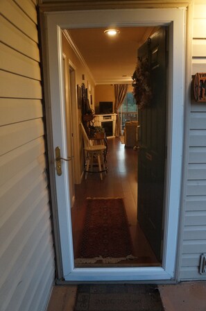 Amazing hardwood floors guide you through our place from the front door to deck.