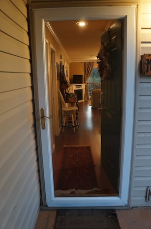 Amazing hardwood floors guide you through our place from the front door to deck.