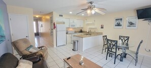 Living room, kitchen, and hallway