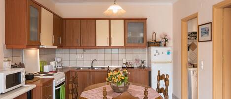 Kitchen and dining area as seen from living room.