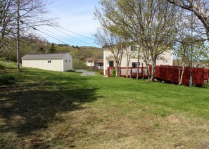 Ample parking in the private lane between the house and shed