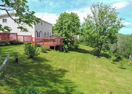 The house is a duplex style home with a large yard. Owners live in other house.