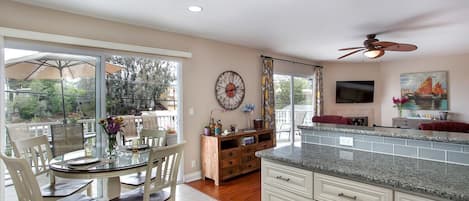 From kitchen looking into living room with Smart TV