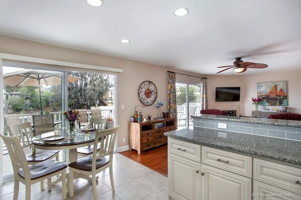 From kitchen looking into living room with Smart TV