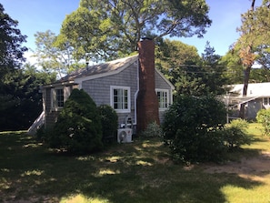 South side view of Cottage showing location of outside Ductless AC unit.