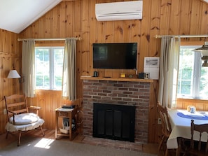 Living room area with 32" HDTV Smart Cable TV (Netflix, etc. available).