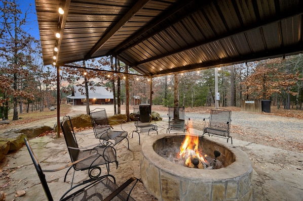 Fire pit in between the main house and game room