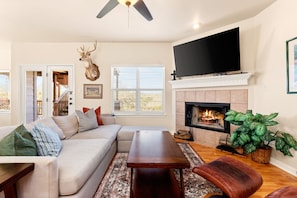 Plop on the couch and enjoy your favorite movie in our cozy living room!
