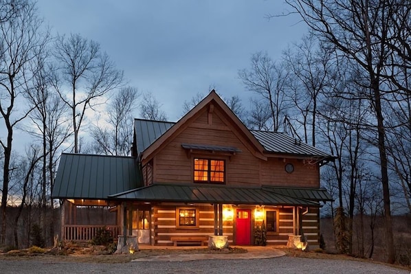 Caspian Cottage, nestled in the trees. Ample parking, screened-in porch.