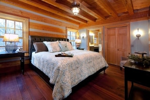 Downstairs bedroom with king size bed, close, attached bathroom.