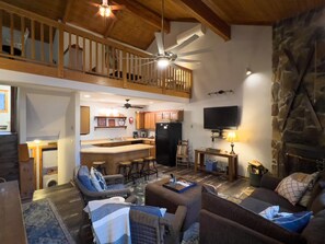 Lofted bedroom on fourth floor above kitchen and family room