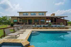 Spacious patio and pool decking for large groups.