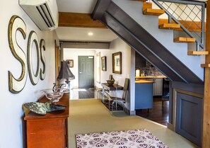 Entrance Hall to  the loft style apartment showing the front door