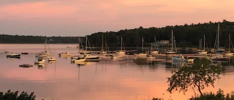 View from our property of sunrise reflected over the harbor.