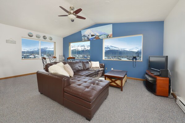 Watch the boats come and go while lounging on the couch!