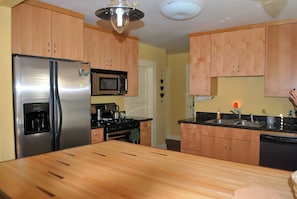 Large kitchen with ample counter space allows group  feasts.