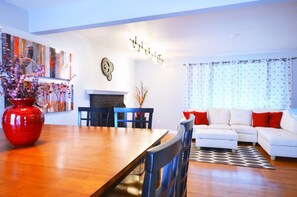 Dining table seats 8, kitchen island seats another 4.