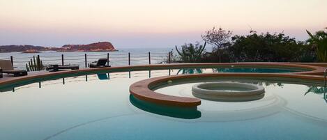 One of the two pools overlooks Tangolunda bay.