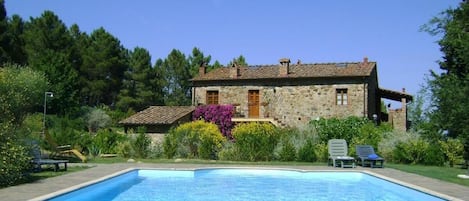 the pool and the house