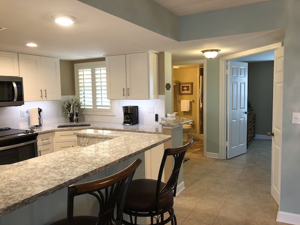 Open plan with upscale kitchen
