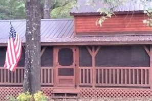 Front entrance to screened in front porch. Your start to a great time.