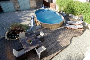 Bird's eye view of pool and decking from bedroom