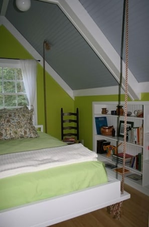 Swinging bed in loft/reading room