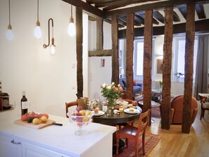 The kitchen/dining area leads to our large very comfortable sitting-room