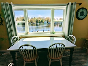 Watch the wildlife on the lake from your dining room.