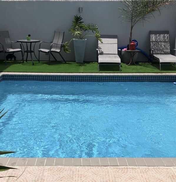 Shared pool area with next door guests (2 guests max in each suite