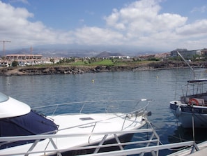 A view o the golf course from the marina