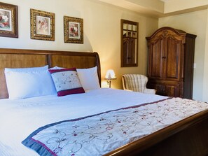 New king size bed and Mattress with upscale bed linens 