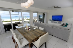 Great dining table and 75' smart TV