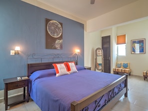 King sized bed with plush pillowtop mattress.