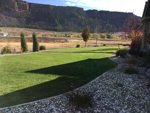 Large level yard that backs up against Steamboat Rock State Park.